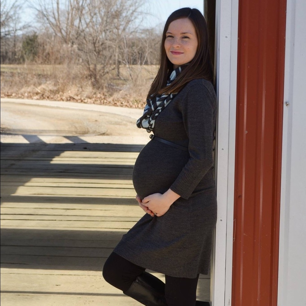 Women’s grey sweater dress with infinity scarf.
